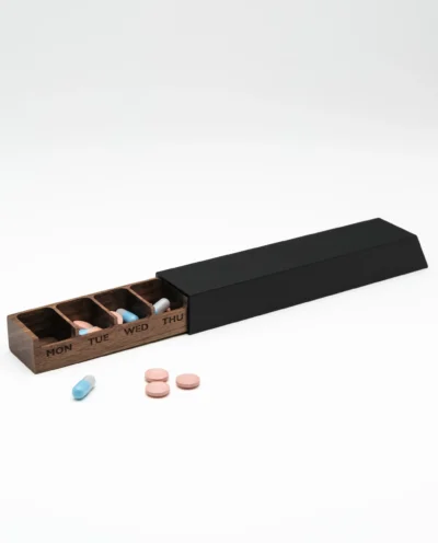 Monolith L pillbox in black, walnut